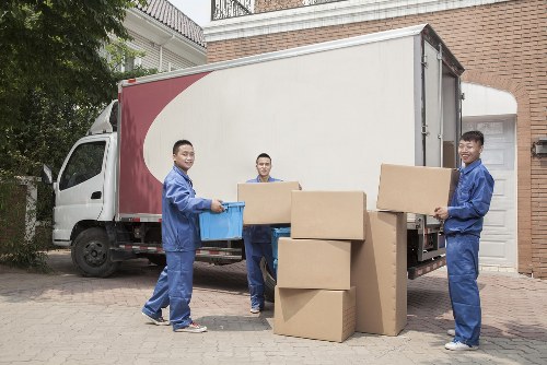 Removal team loading furniture for a house move in Sutton