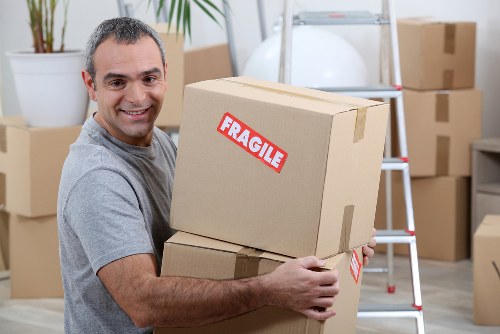 Person using an accessible self storage website on a laptop in Sutton